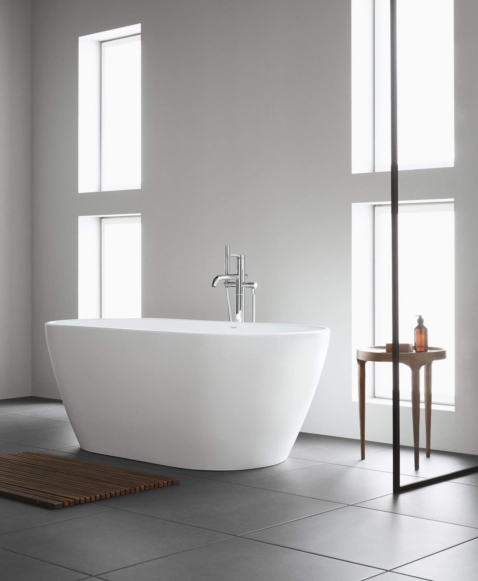 Duravit 700477-C-18TALL D-Neo 63" Free Standing Solid Surface Soaking Tub with Center Drain, Drain Assembly, and Overflow -